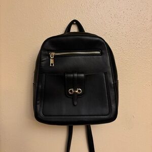 Black Leather Backpack with Gold Accents
